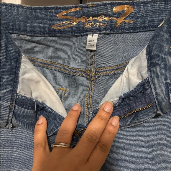 Seven7 Denim - Seven7 Light Blue Slim Flare Jeans with Distressed Accents.